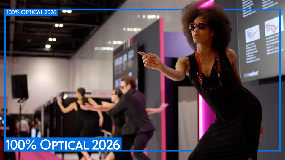 A model poses on the 100% Optical Catwalk wearing bold eyewear
