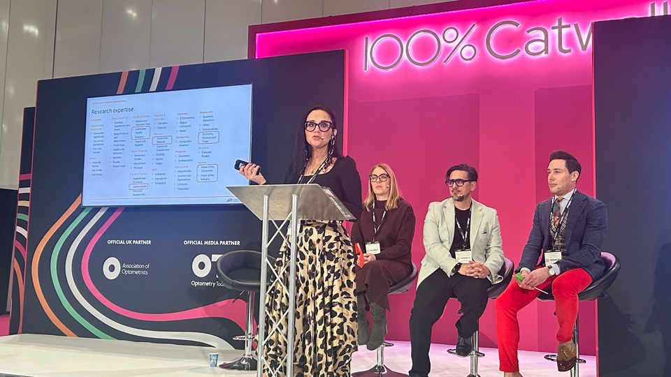 Natasha Cazin, Garry Kousoulou, Grace Downes, and Daniel Barnes on stage at 100% Optical 2026