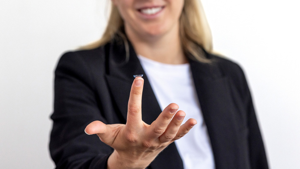 Contact lens on a finger
