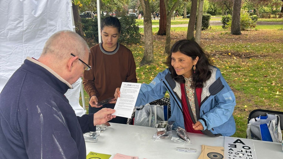 Bansri Shah speaking to a patient at Street Fest