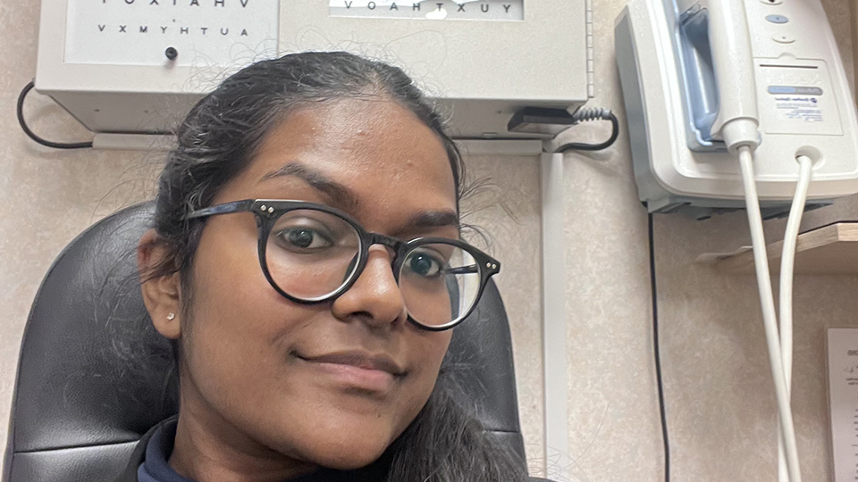 Narthika sits in a consulting room