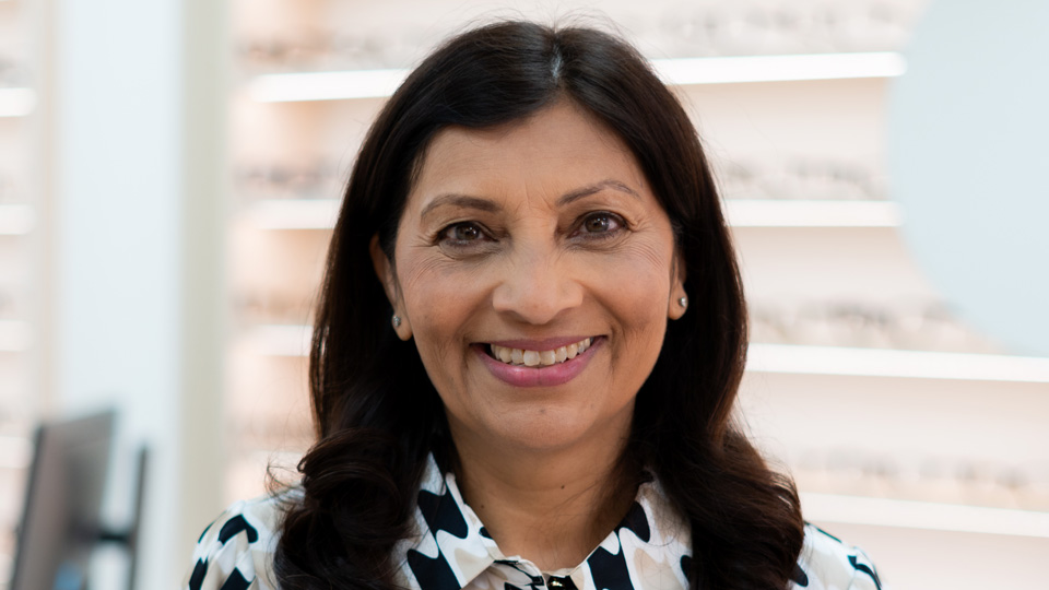 Woman smiling with black hair 