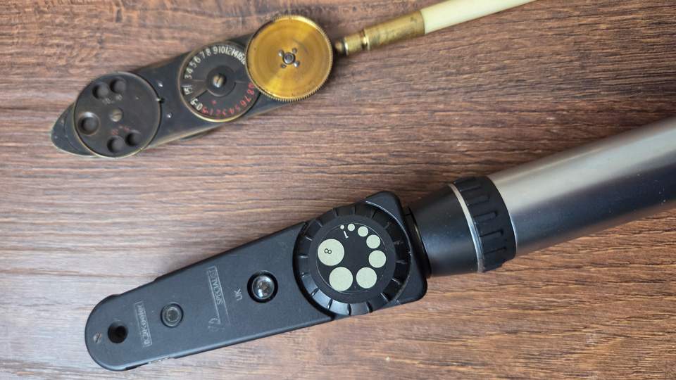 A Keeler specialist ophthalmoscope and antique direct ophthalmoscope