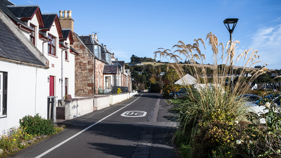 Cottages on Henrietta Street in the village of Avoch, on The Black Isle, Ross and Cromarty, Scotland. The village is quiet and well-kept by its residents, with many sea front cottages painted in colourful shades