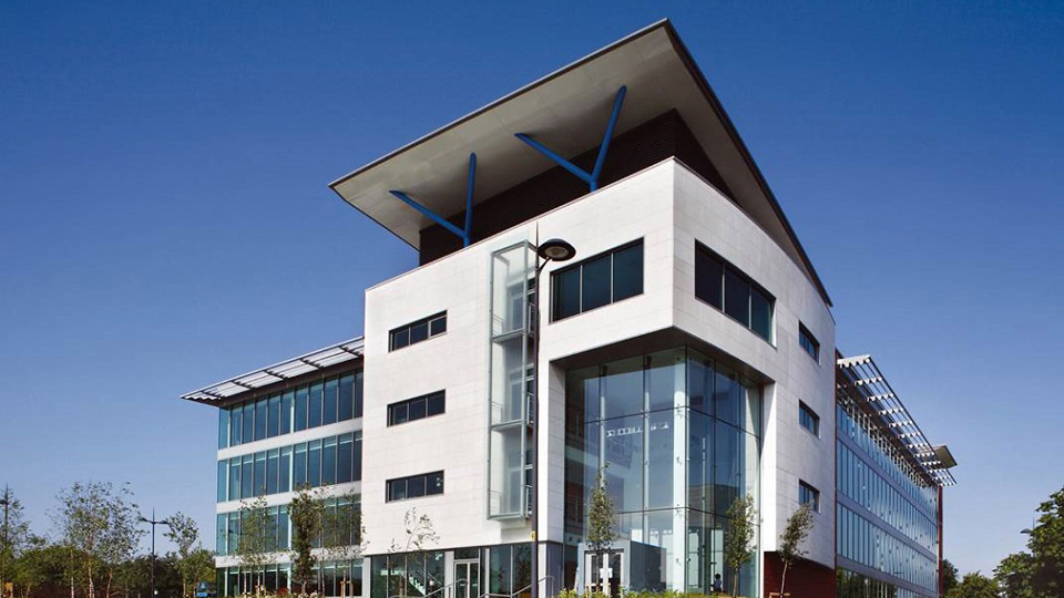 A large glass and metal hospital building