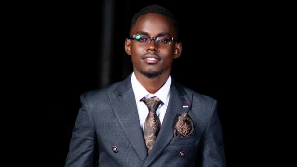 Denis in a suit