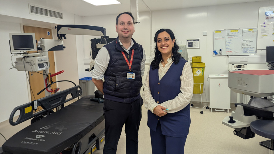 Alex Silvester and Kirith Entwistle stand together in a clinical treatment room in a SpaMedica Bolton facility on an MP visit