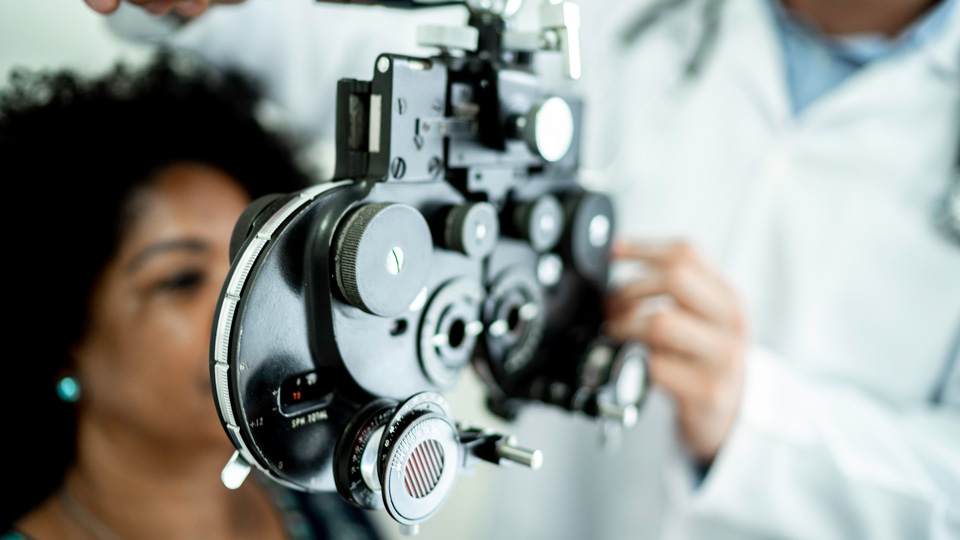 A woman receives an eye examination