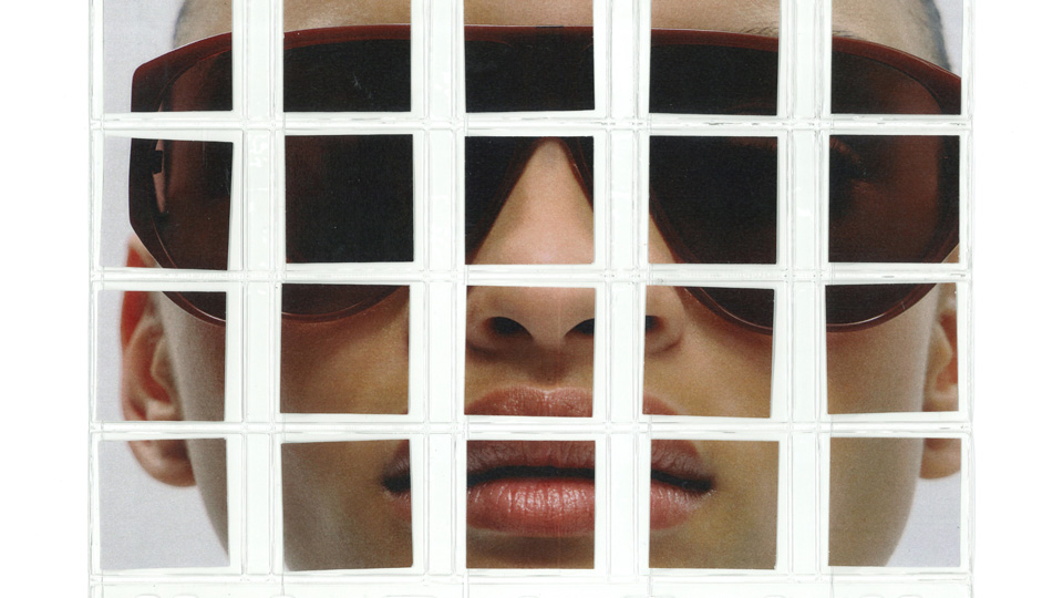 A collage of 20 photos, arranged in five rows of four, depict one large image of a super close up of a model in bold sunglasses