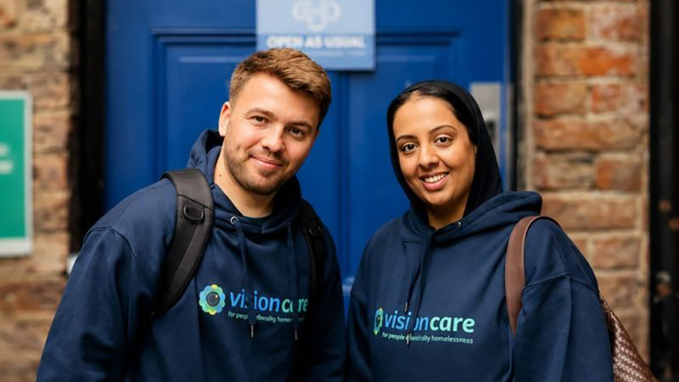 Vision Care volunteers wearing branded hoodies