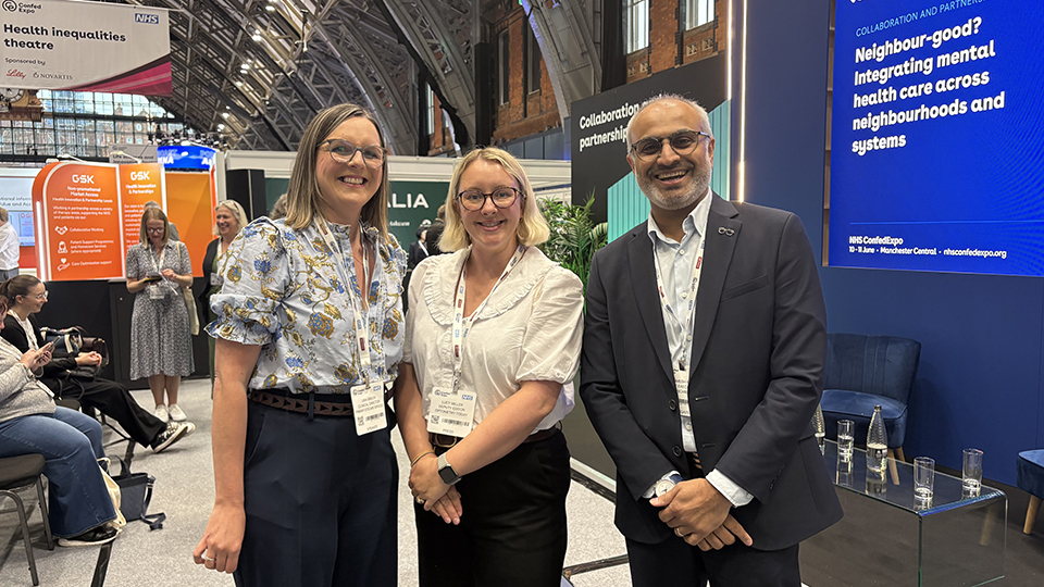 Dharmesh and Lisa smiling at the camera during NHS Confed Expo