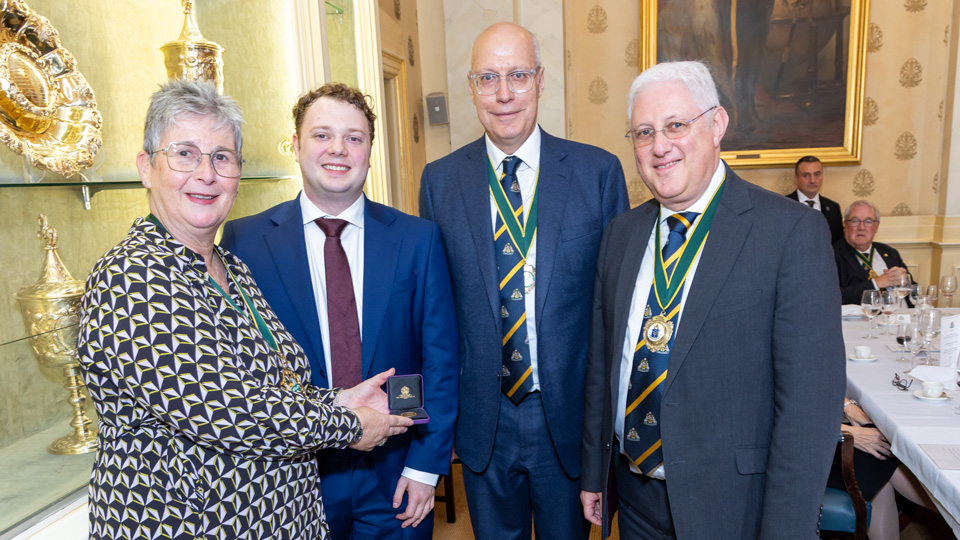 Callum Hunt is presented with the Master's Medal