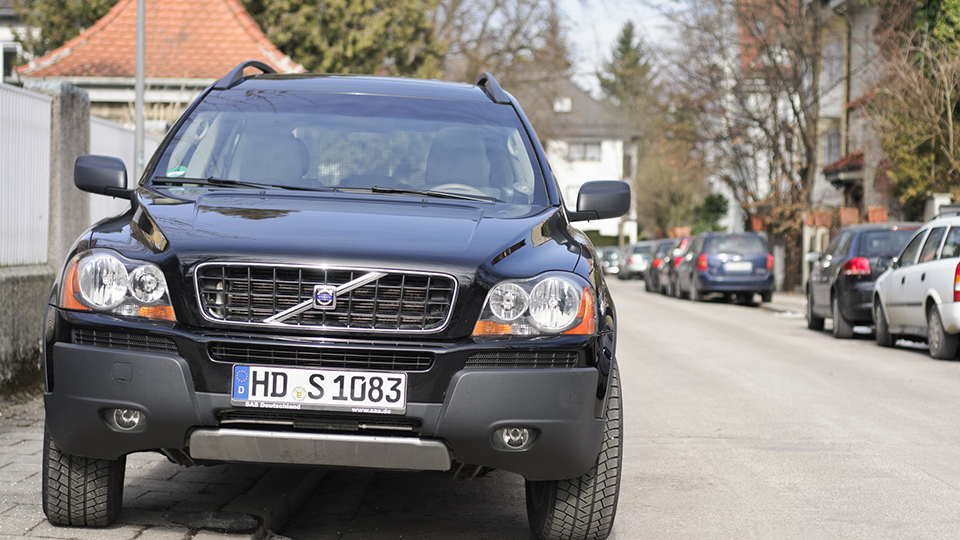 SUV parked blocking a residential street