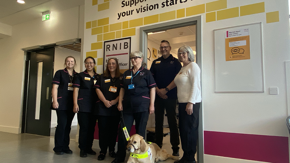 ECLOs and RNIB staff outside the new ECLO room