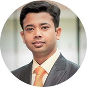 Debarun Dutta headshot in grey suit