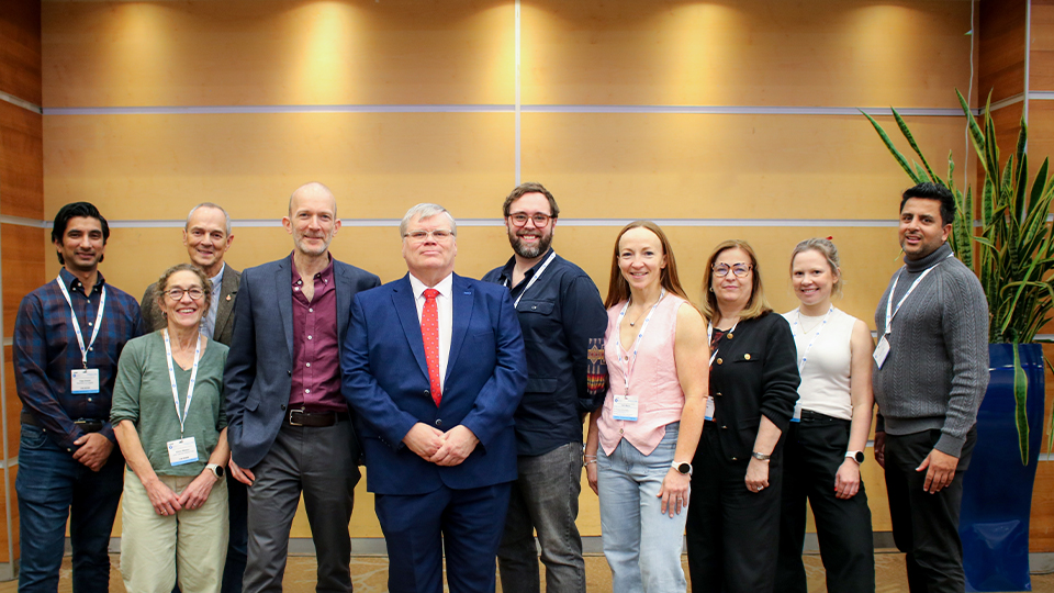 The Hosptical Optometrists Committee gather for a group photo 