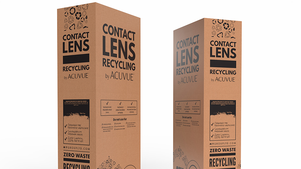 Two tall cardboard boxes with recycling symbols and bold text stating Contact Lens recycling by Acuvue