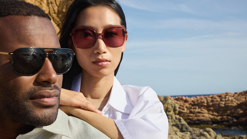 Two people each wearing the new sunglasses from Silhouette in earthy, muted tones
