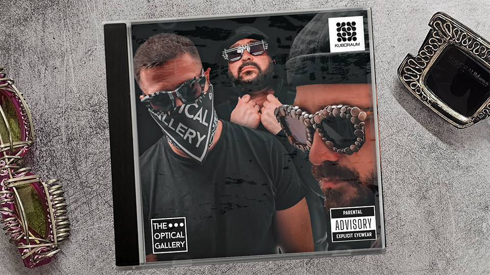 Grime-style CD cover image showing Nicos and his two brothers dressed in black 