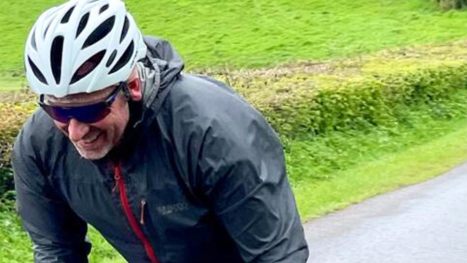 Optometrist and practice owner, Karl Hallam, cycling
