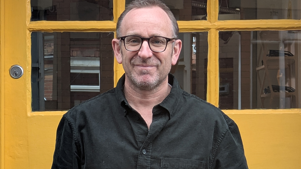 Optometrist, Karl Hallam, outside Eyeye in Sheffield