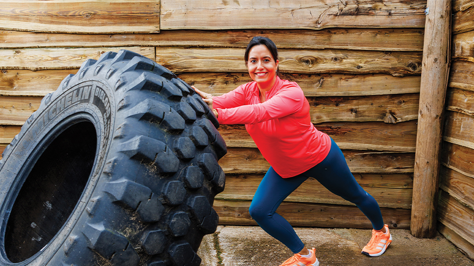 IP optometrist and The Optical People director, Jaclyn Pugh, pushes a tyre in exercise clothes