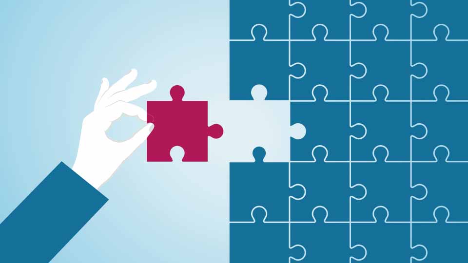 Illustration of blue puzzle pieces laid out flat with a hand placing a red one into the final remain