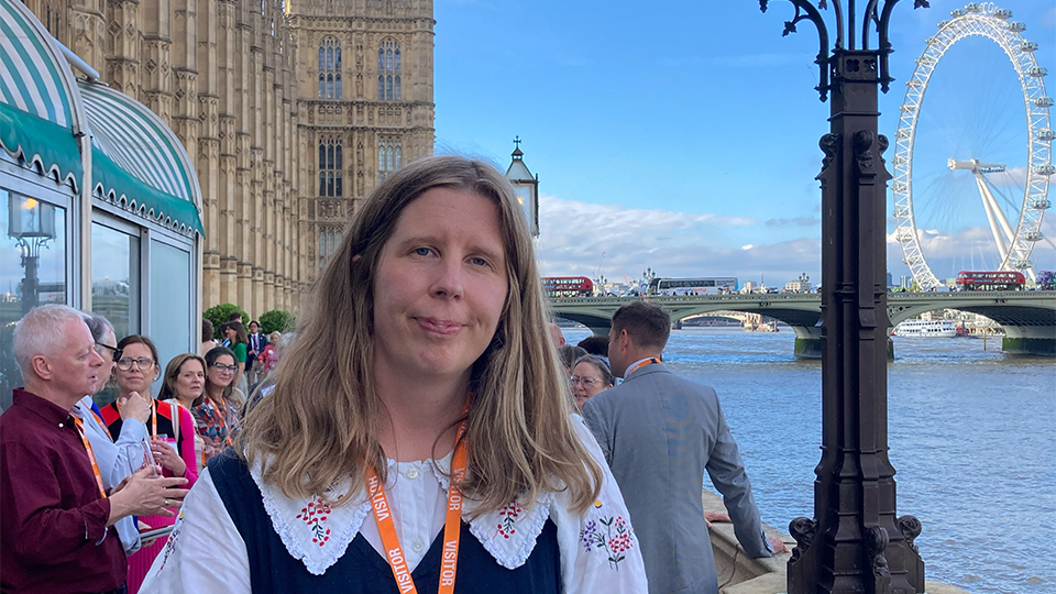 Selina Powell standing on a balcony in parliament