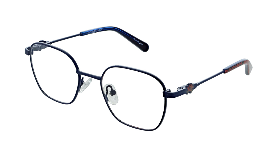 A fine metal frame in a dark blue with patterned red temple tips. On the side of the frame is a small metal disc with the Mr Noisy character