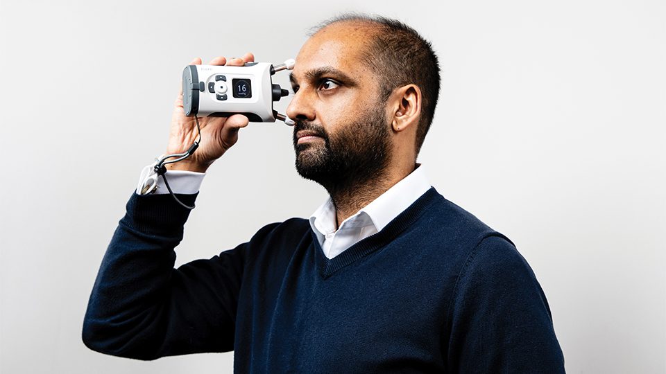 Ashish Chokshi with the iCare HOME2 device