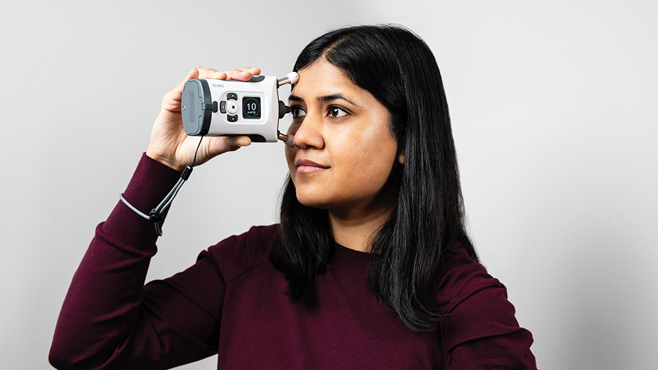 Tanvi Shah with the iCare HOME2 device