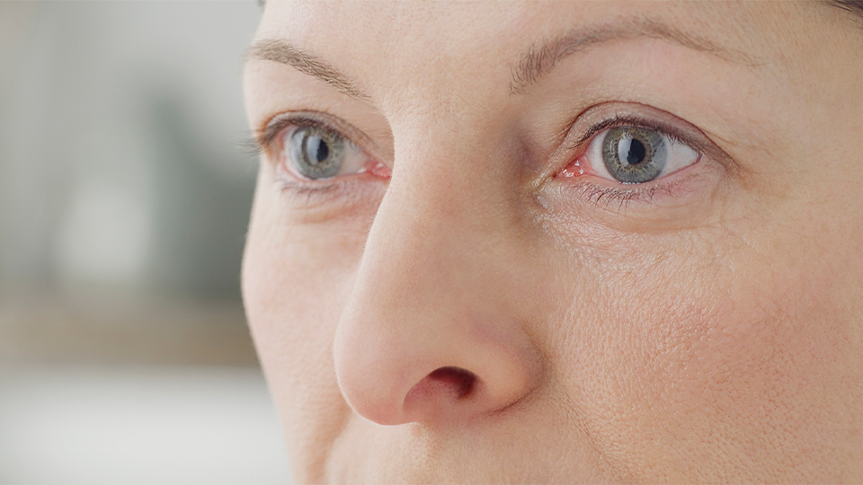 Close up of a Caucasian woman with grey eyes