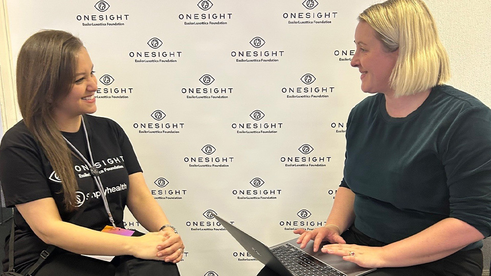 Lucy Miller sitting with optometrist Shweta Anand