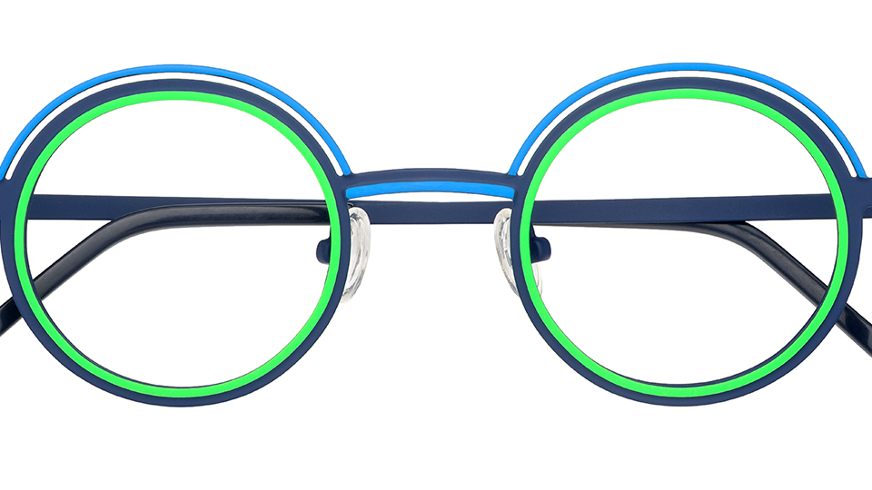 A pair of circle lens frames with accents in light blue and neon green