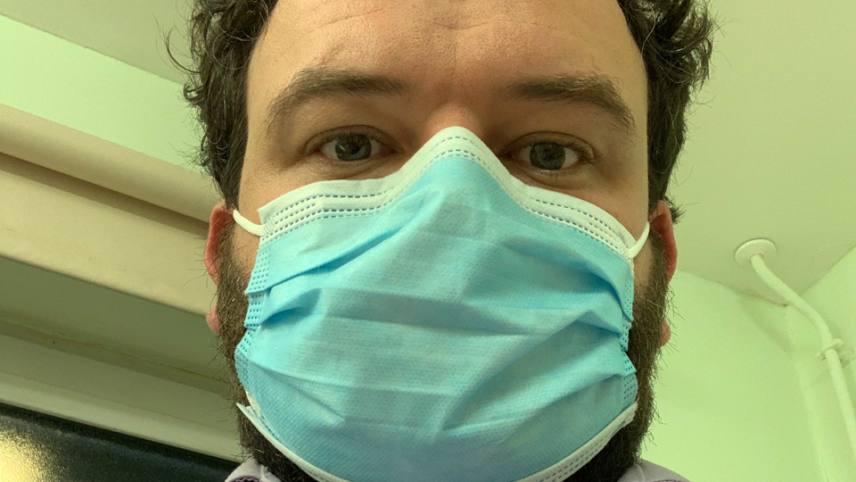 James Brawn wearing a face mask