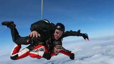 Wirral opticians skydive for cancer charity