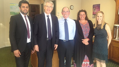 Andrew Jones (second from left) visiting Page & Smith Opticians in Harrogate, Yorkshire