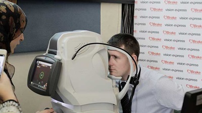David Linden MP has an optical coherence tomography screening at the Westminster eye health event   