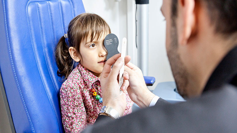 Child having a sight test