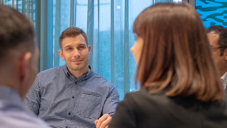 People talking at the CooperVision roundtable event