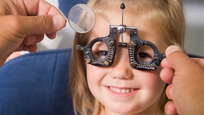 A child having her sight tested