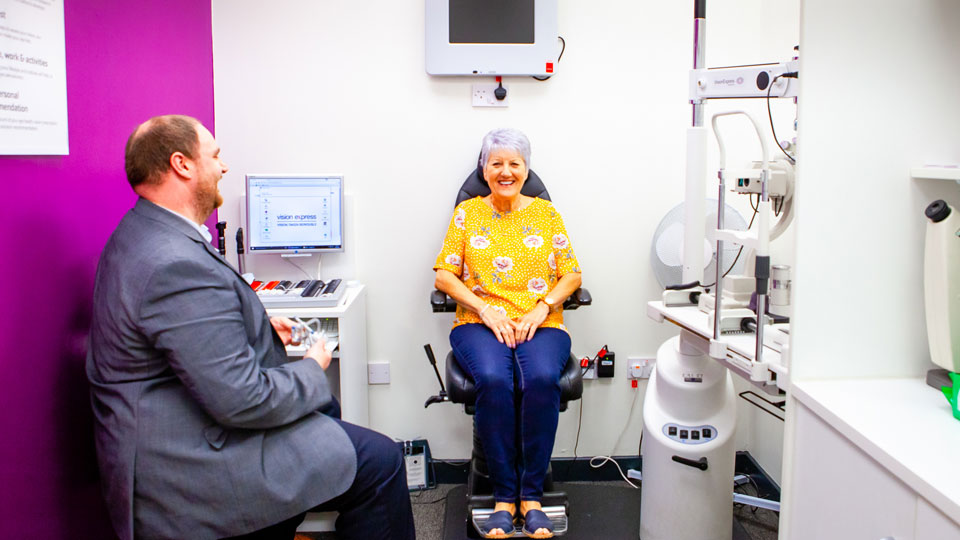 optometrist and patient