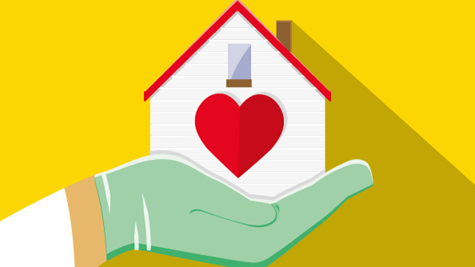 hand holding a house