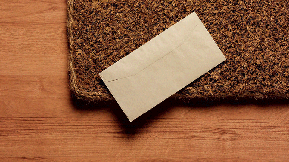 letter on doormat