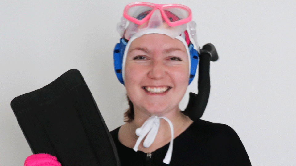 Rebecca in underwater hockey kit