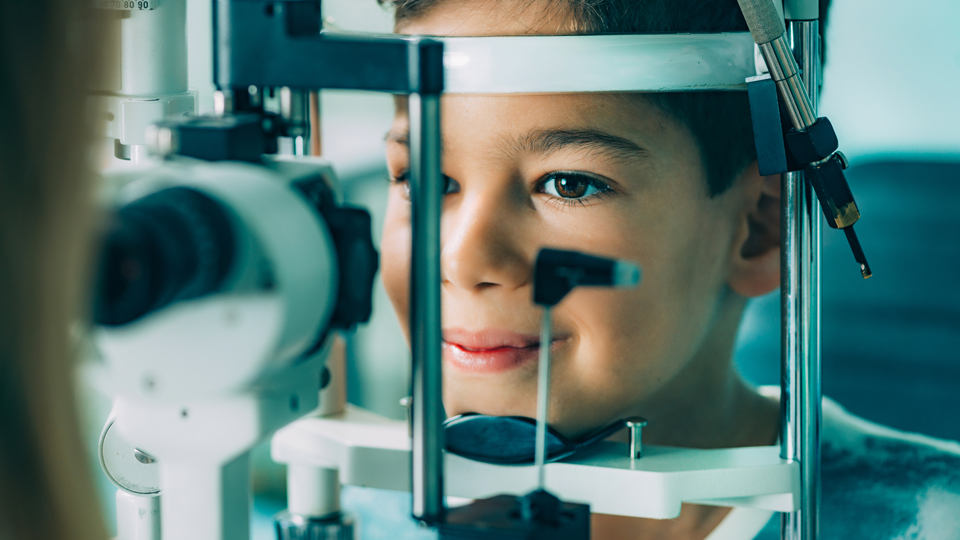 young boy sight test