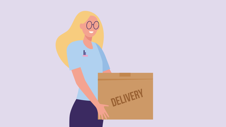 woman carrying a box