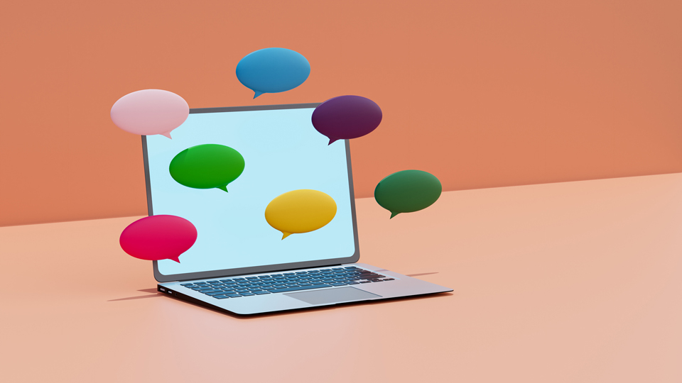 laptop with speech bubbles