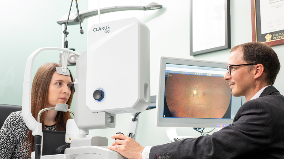 optometrist and patient sight test