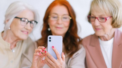 women looking at phone